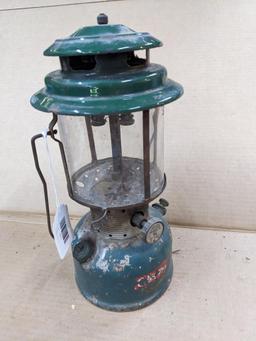 Coleman Model 220F lantern has the Coleman sunburst on the bottom and date code 9-64.