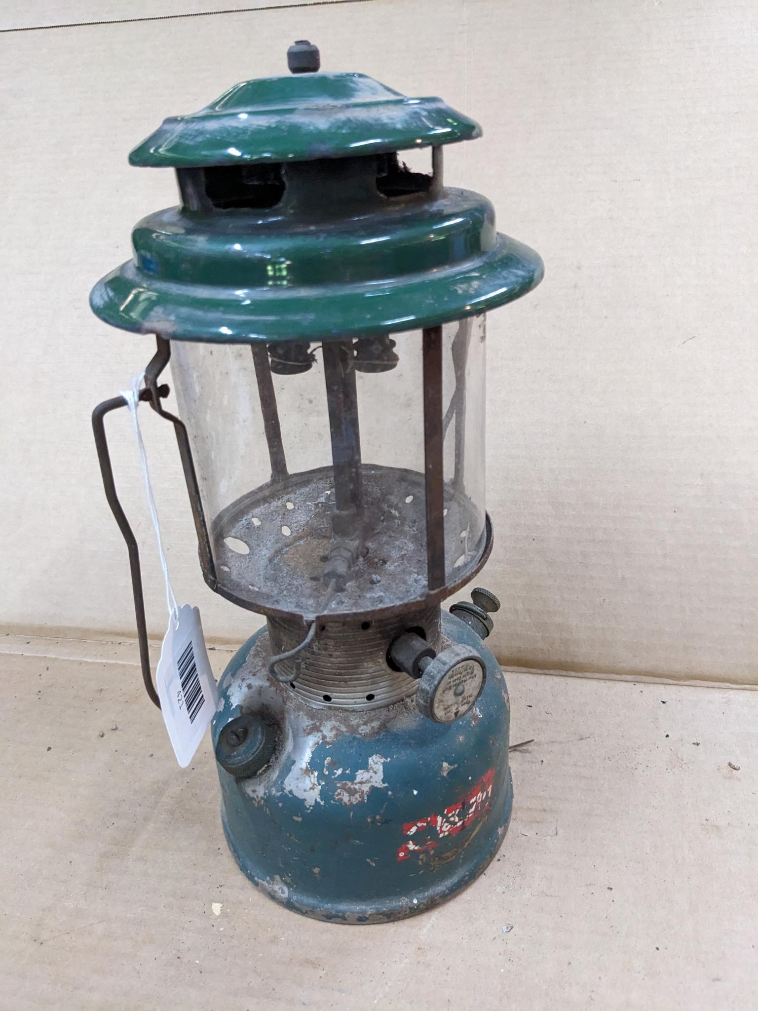 Coleman Model 220F lantern has the Coleman sunburst on the bottom and date code 9-64.