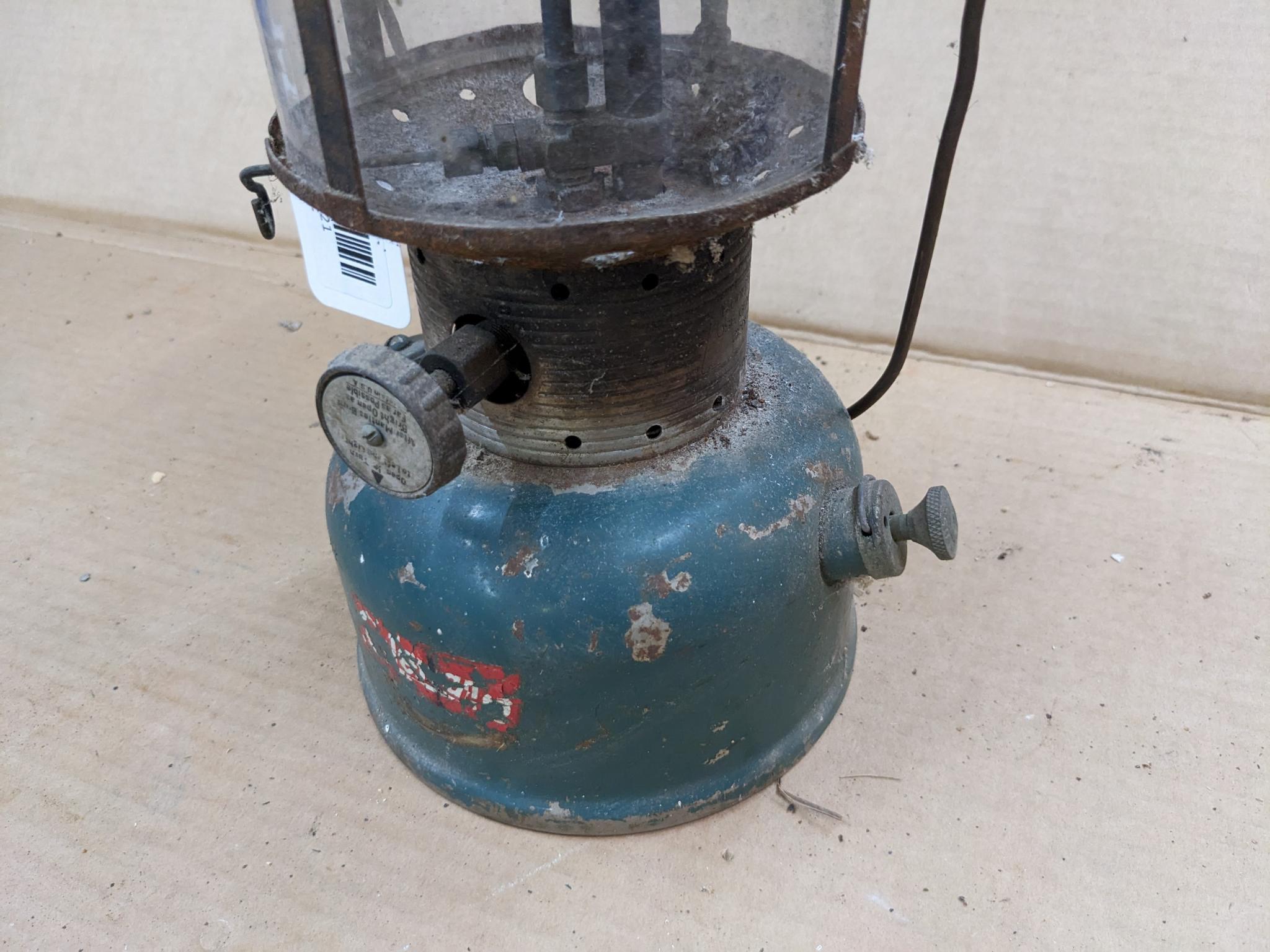 Coleman Model 220F lantern has the Coleman sunburst on the bottom and date code 9-64.