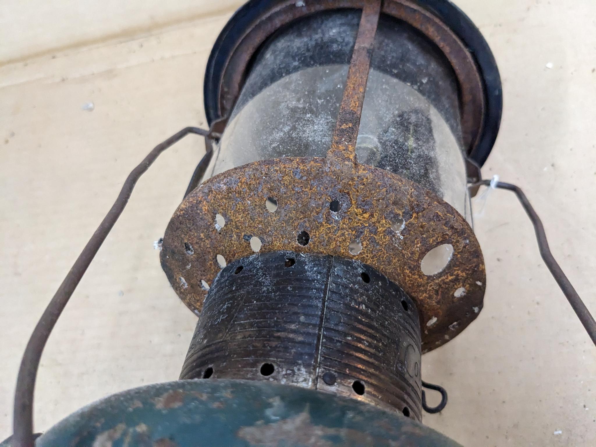 Coleman Model 220F lantern has the Coleman sunburst on the bottom and date code 9-64.