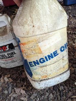 No shipping. Mostly full bottle of diesel fuel supplement; mostly empty bottle of heavy engine oil;