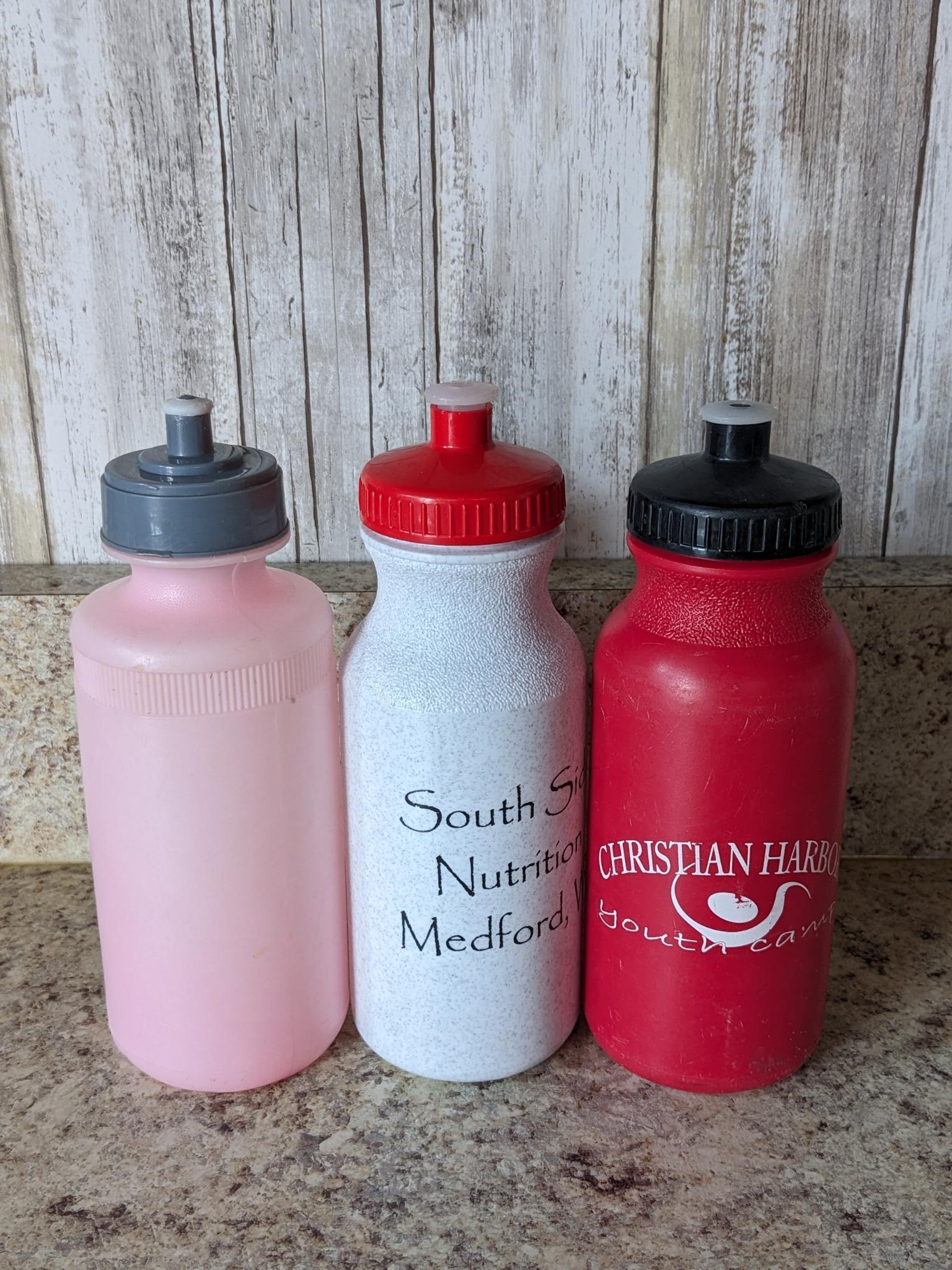 Assorted water bottles and cups as pictured.
