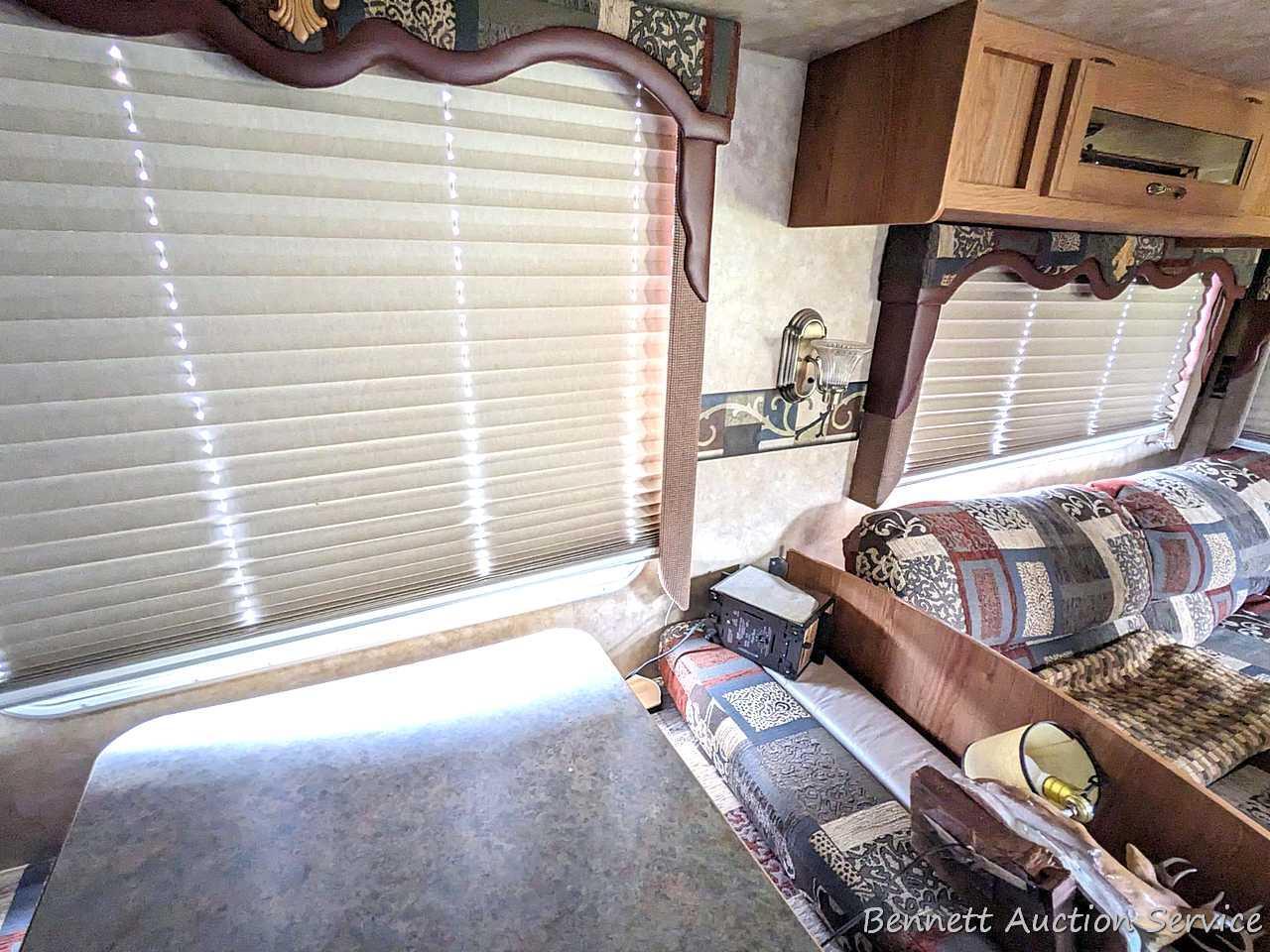 Jayco Eagle 314 BHDS slide-out camper has three beds, bathroom with shower...