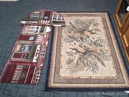 41" x 62" Tropical Bliss Spice rug, and a pair of matching kitchen rugs. All in good condition,