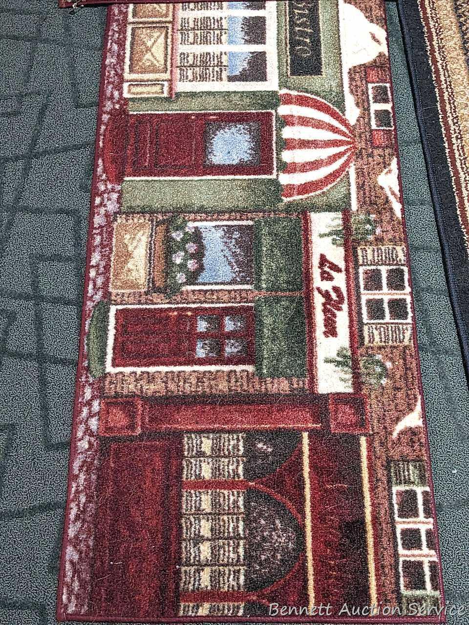 41" x 62" Tropical Bliss Spice rug, and a pair of matching kitchen rugs. All in good condition,