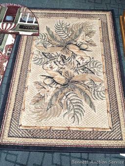 41" x 62" Tropical Bliss Spice rug, and a pair of matching kitchen rugs. All in good condition,