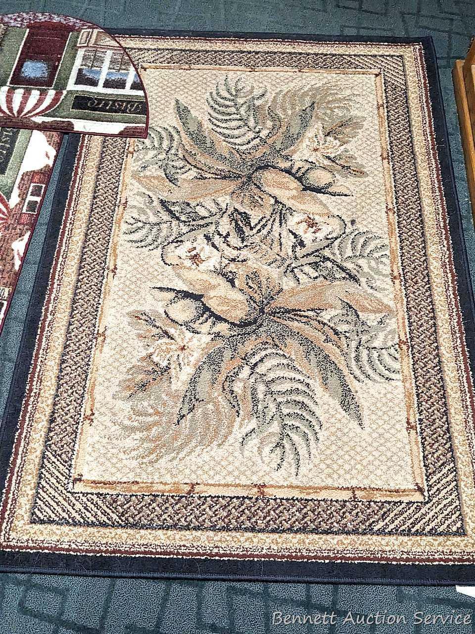 41" x 62" Tropical Bliss Spice rug, and a pair of matching kitchen rugs. All in good condition,