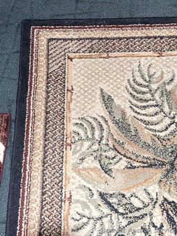 41" x 62" Tropical Bliss Spice rug, and a pair of matching kitchen rugs. All in good condition,