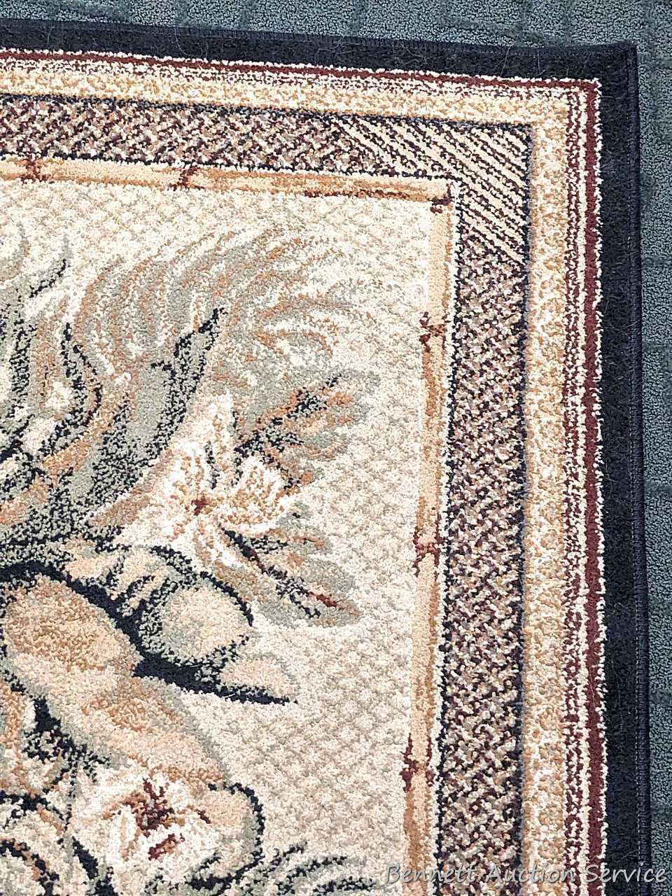 41" x 62" Tropical Bliss Spice rug, and a pair of matching kitchen rugs. All in good condition,