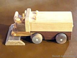 Neat wooden toys incl 12" bulldozer, airplane, more. Fun pieces.