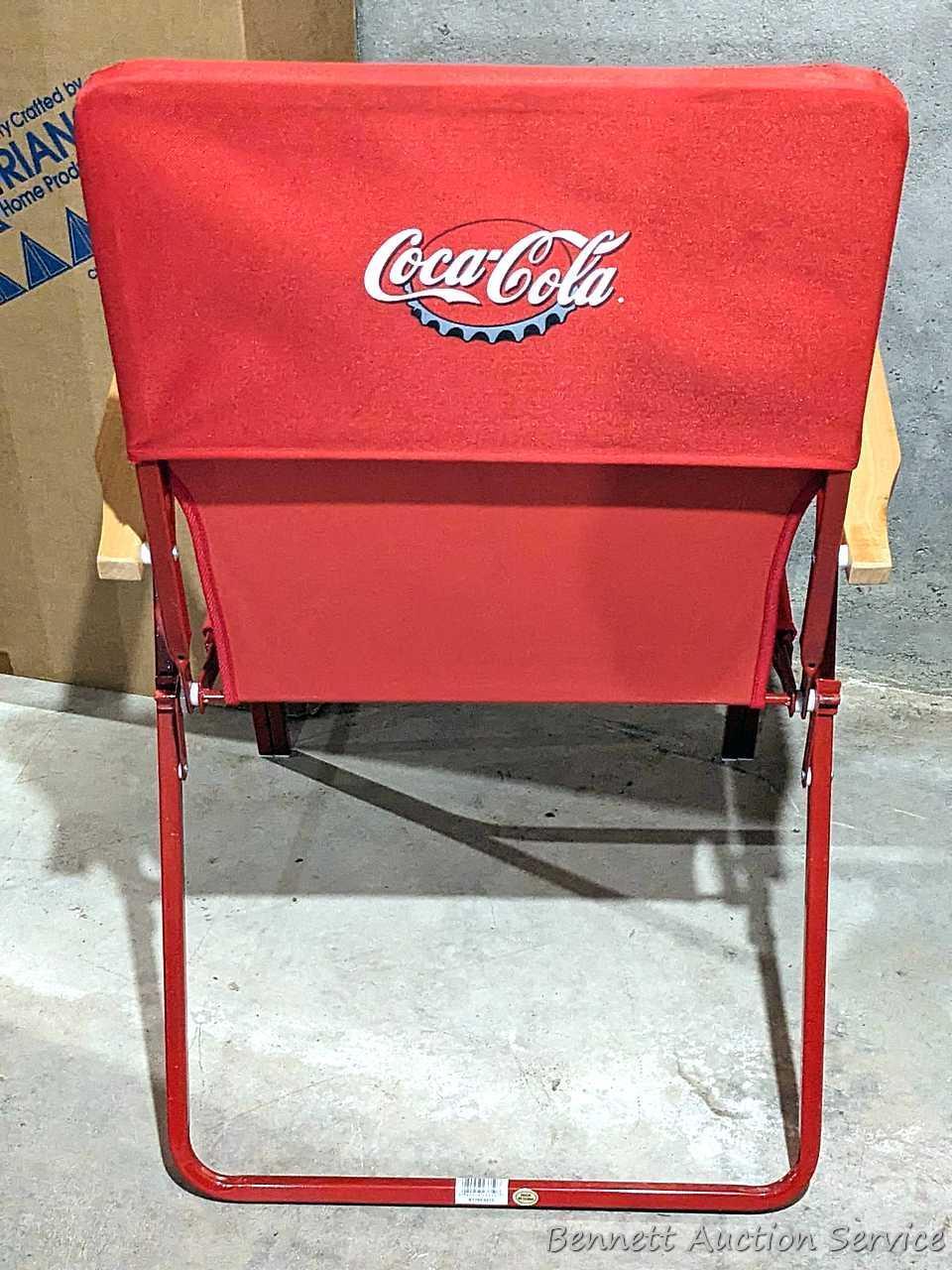 Nice Coca-Cola folding chair about 23" over wooden arms, plus a clock and phone that look new.