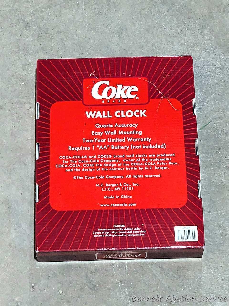 Nice Coca-Cola folding chair about 23" over wooden arms, plus a clock and phone that look new.