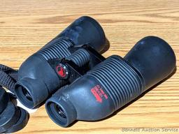 Jason Perma Focus 2000 10x50 binoculars are about 7" long. Look fairly clear.
