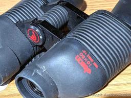 Jason Perma Focus 2000 10x50 binoculars are about 7" long. Look fairly clear.