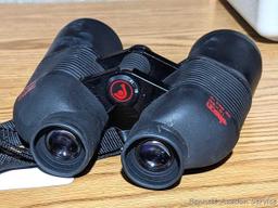 Jason Perma Focus 2000 10x50 binoculars are about 7" long. Look fairly clear.
