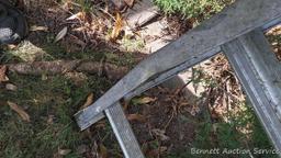 Aluminum extension ladder section is approx. 12'.