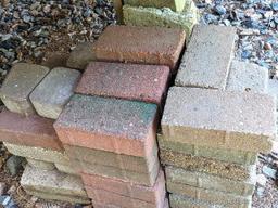 Pile of landscape pavers measures approx. 2' x 15" x 12".