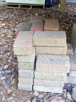 Pile of landscape pavers measures approx. 2' x 15" x 12".