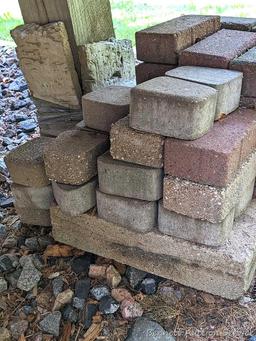 Pile of landscape pavers measures approx. 2' x 15" x 12".