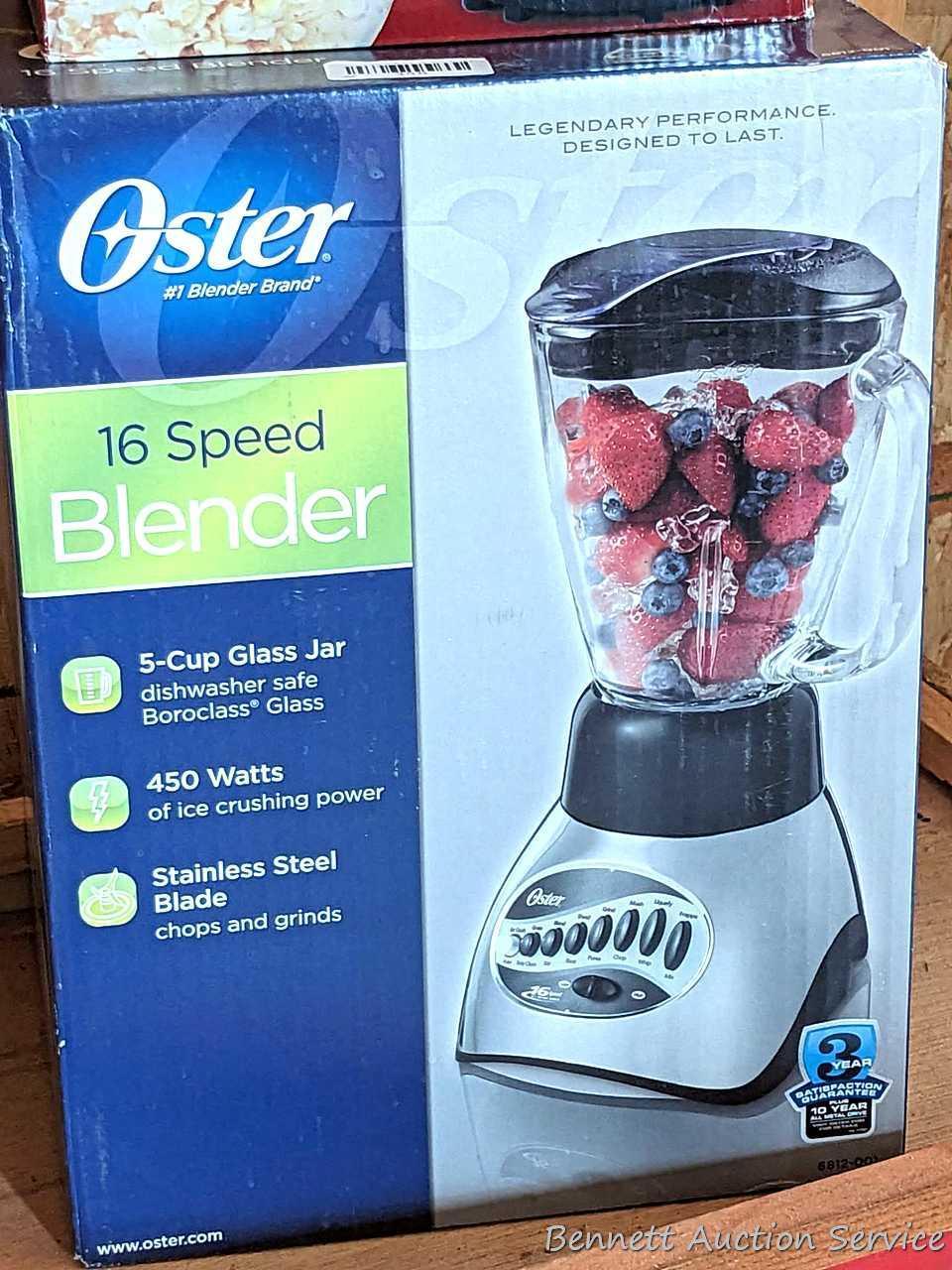 Oster 16 speed blender looks to be NIB, Air Crazy popcorn popper, and a pair of ice cube trays.