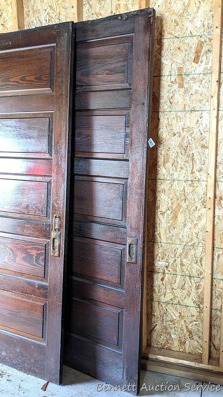 Pair of vintage sliding doors with the classy copper hardware. The doors measure approx 32" x 84"