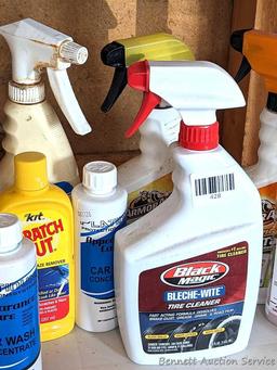 Full and partial bottles of automotive cleaners including leather cleaner, scratch out, tire white,