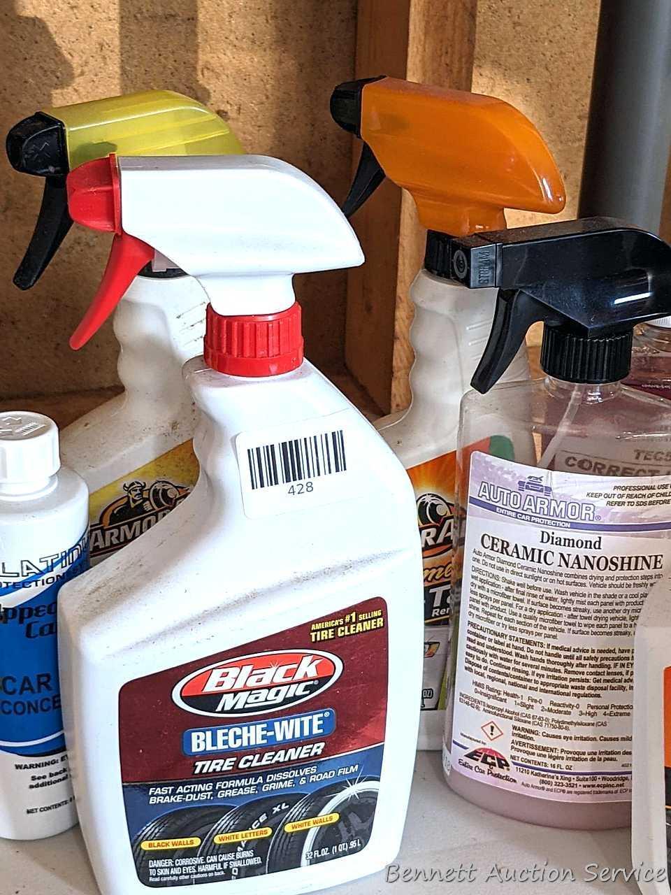 Full and partial bottles of automotive cleaners including leather cleaner, scratch out, tire white,