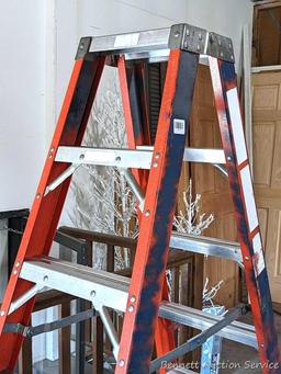 6' fiberglass step ladder is sturdy and in good condition.