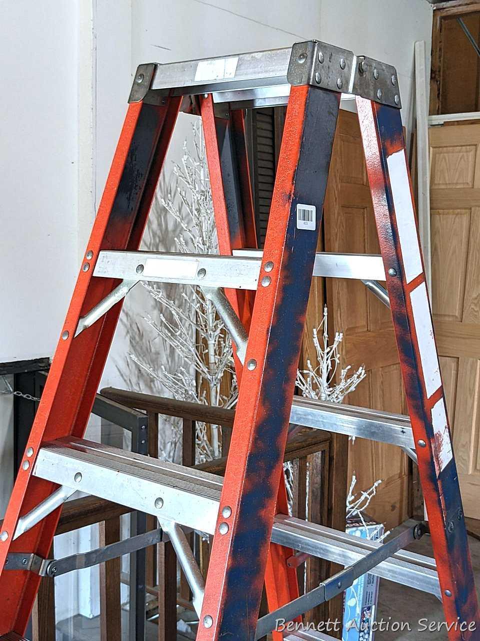 6' fiberglass step ladder is sturdy and in good condition.