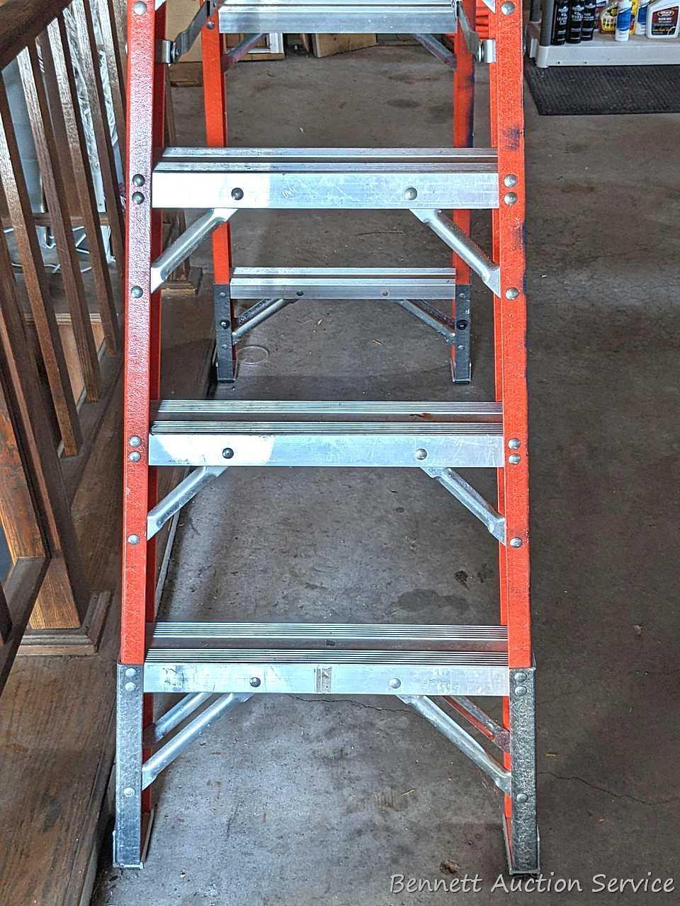6' fiberglass step ladder is sturdy and in good condition.