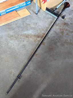 Several bottles of ATV oil, yard torch and fuel, and more.
