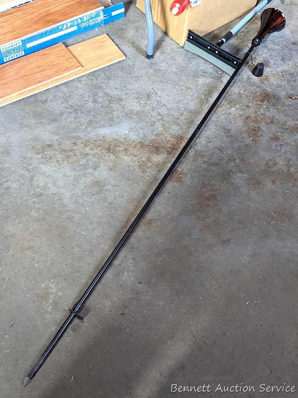 Several bottles of ATV oil, yard torch and fuel, and more.