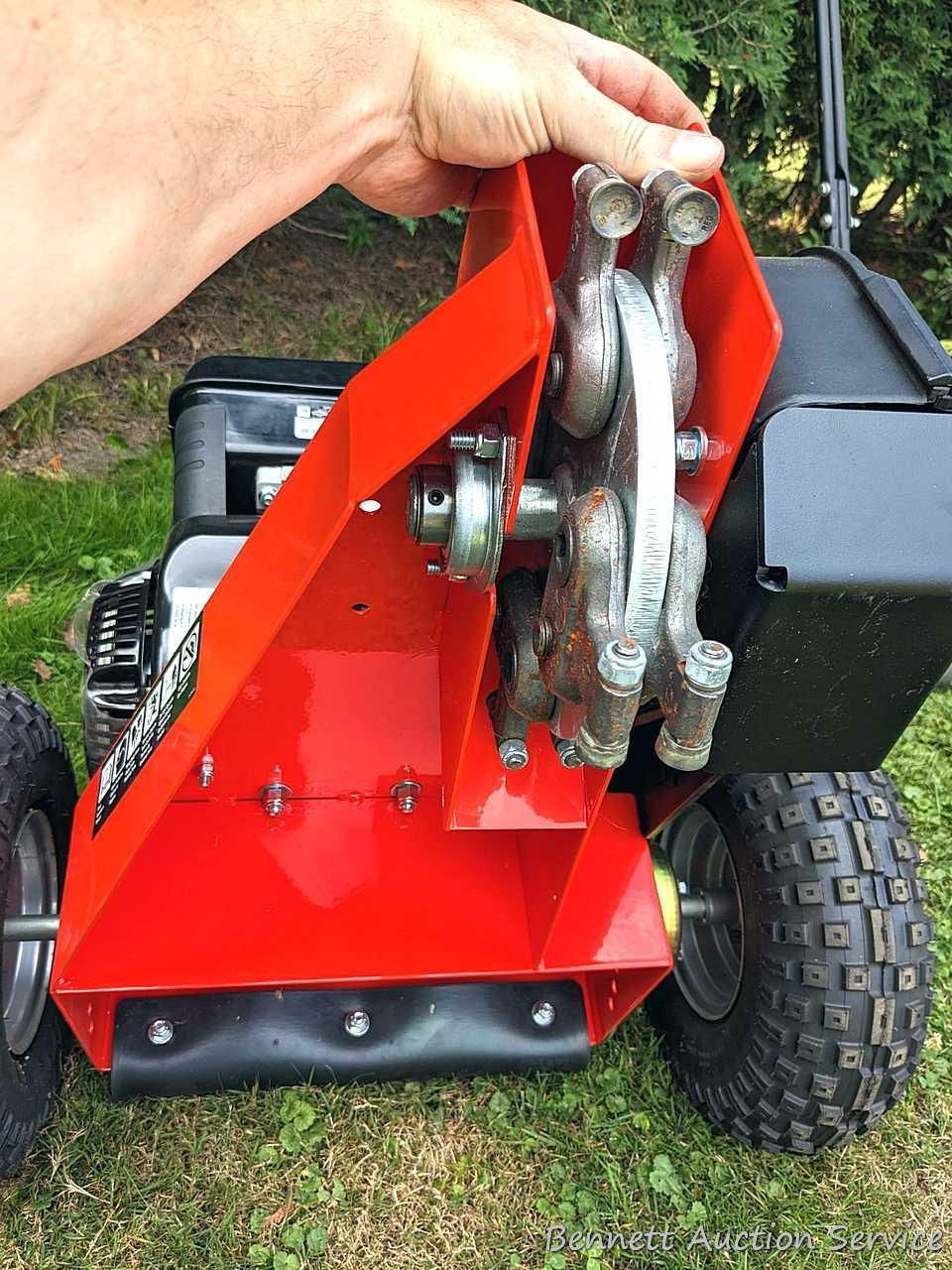 DR Stump Grinder Pro XL comes with manual, battery, oil, wrenches, etc. Appears as-new, as it's not