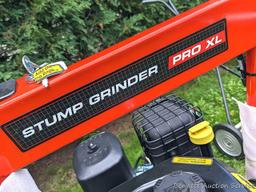 DR Stump Grinder Pro XL comes with manual, battery, oil, wrenches, etc. Appears as-new, as it's not