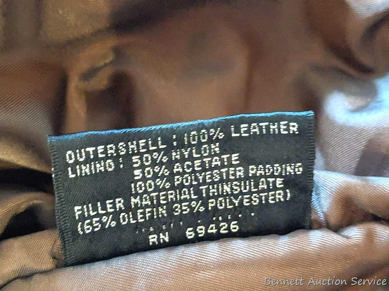 Brown leather jacket by Wilsons is men's size XL and in good condition.