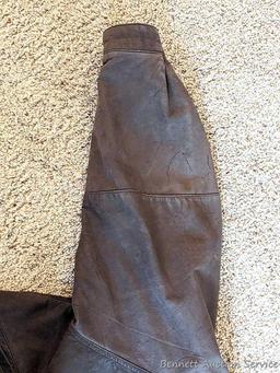Brown leather jacket by Wilsons is men's size XL and in good condition.