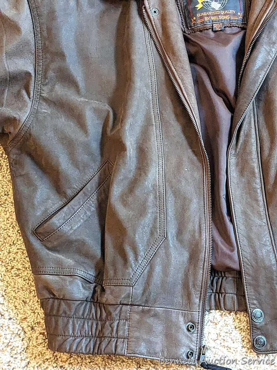 Brown leather jacket by Wilsons is men's size XL and in good condition.