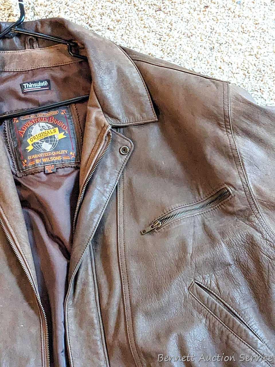 Brown leather jacket by Wilsons is men's size XL and in good condition.