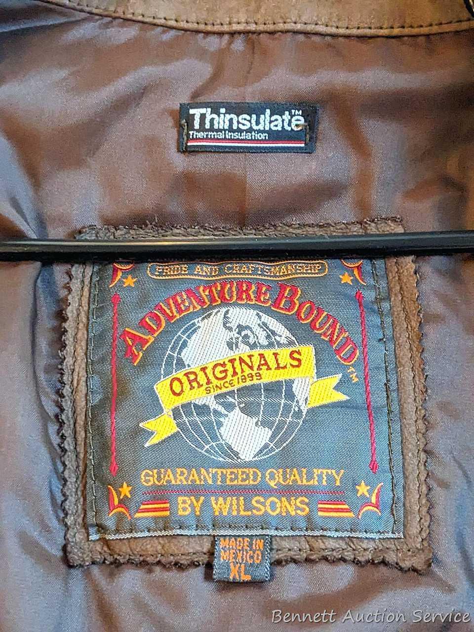 Brown leather jacket by Wilsons is men's size XL and in good condition.