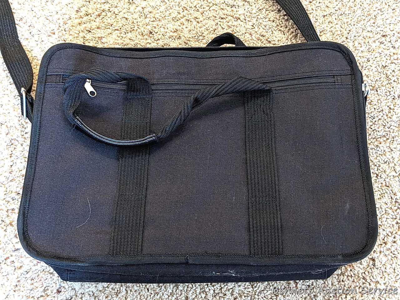 Two American Tourister carry on bags, plus another with wheels for easy travel; Also a tote bag and