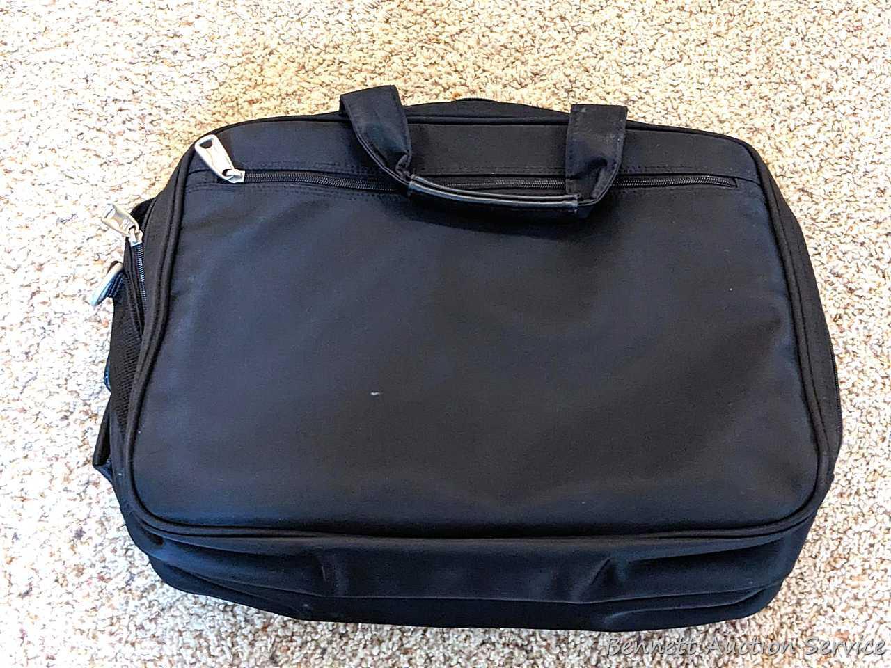 Two American Tourister carry on bags, plus another with wheels for easy travel; Also a tote bag and