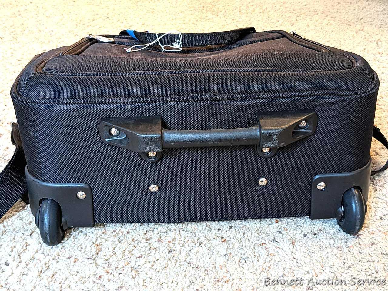Two American Tourister carry on bags, plus another with wheels for easy travel; Also a tote bag and