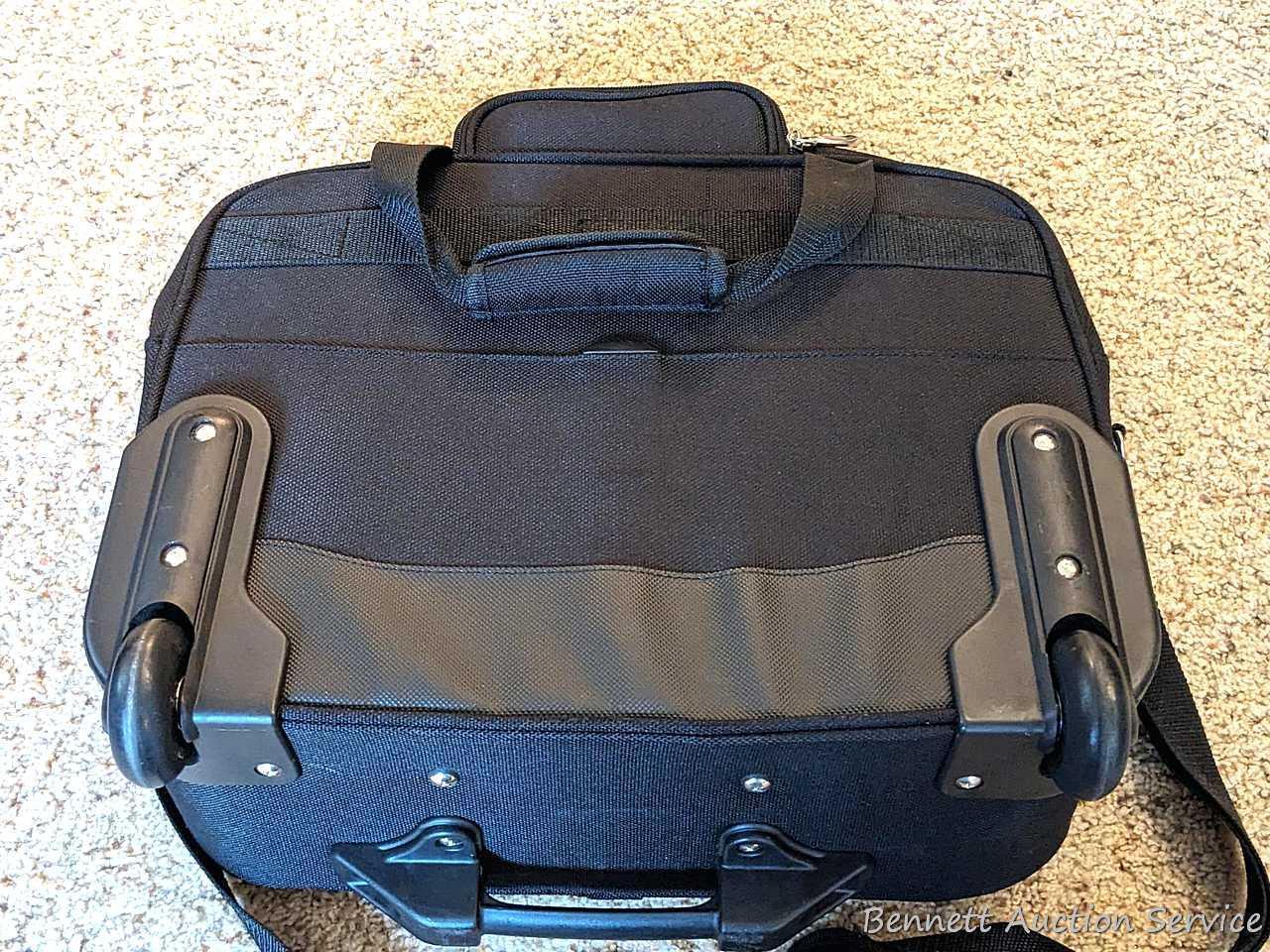 Two American Tourister carry on bags, plus another with wheels for easy travel; Also a tote bag and