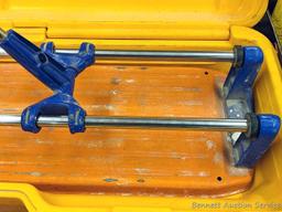Felker TS-40 Rubi tile cutter is nearly 2' long and comes with assorted cutters, fence and hard