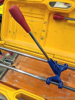 Felker TS-40 Rubi tile cutter is nearly 2' long and comes with assorted cutters, fence and hard