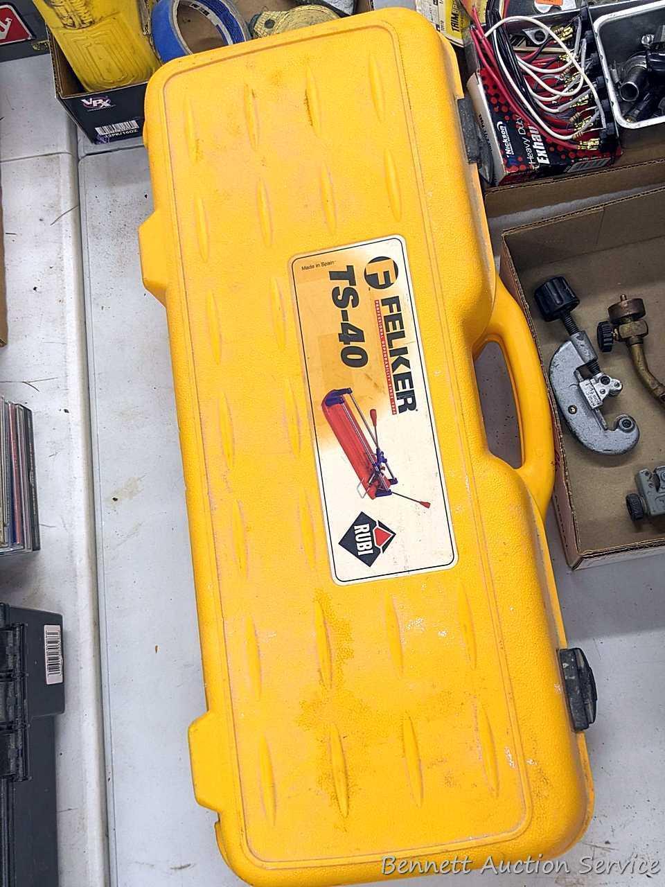 Felker TS-40 Rubi tile cutter is nearly 2' long and comes with assorted cutters, fence and hard