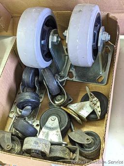 Pair of heavy duty 5" casters, and several other swiveling casters.