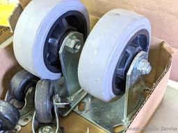 Pair of heavy duty 5" casters, and several other swiveling casters.