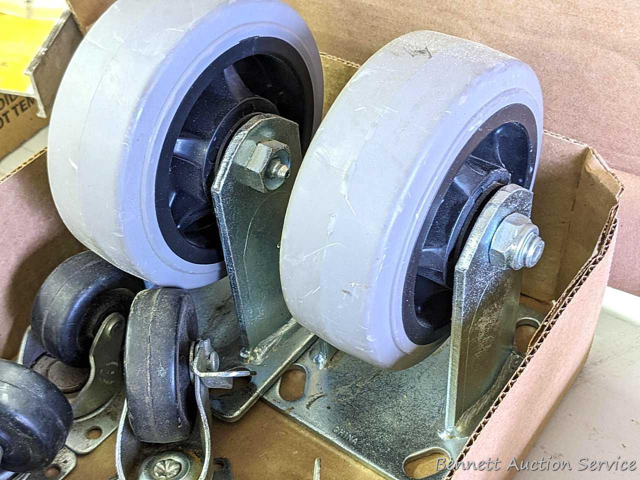 Pair of heavy duty 5" casters, and several other swiveling casters.