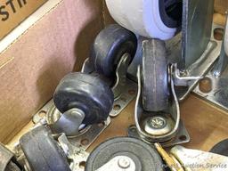 Pair of heavy duty 5" casters, and several other swiveling casters.